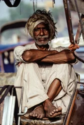 Pakistani Rickshaw Taxi Porter Waiting for a Fare in Karachi, Pakistan