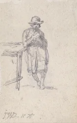 A Boy Leaning against a Table