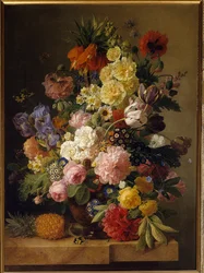 Flowers on a marble console with a pineapple