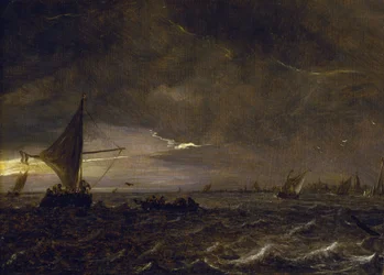 Fishing boats in an estuary at dusk, with a view of a city and its bell tower on the horizon