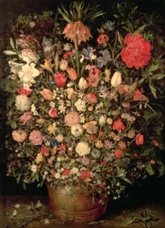 Large bouquet of flowers in a wooden tub
