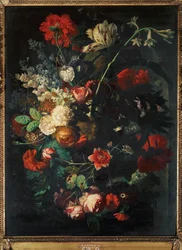 Vase with flowers on a socle