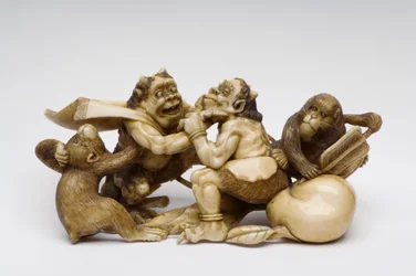 Okimono of two demons fighting, watched by two monkeys
