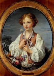 Young boy in the basket of flowers