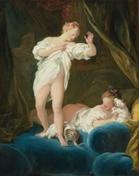 Two Girls on a Bed Playing with Their Dogs