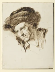 Head of a man wearing a fur cap