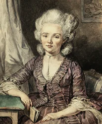 A Young Lady Seated by a Table with a Book