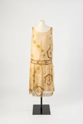 Yellow silk chiffon evening dress embroidered with yellow floss silk, sequins, bugle beads and yellow brilliants
