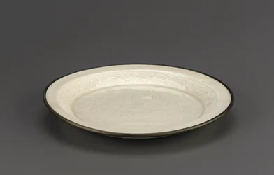 Ding ware dish with moulded decoration of mandarin ducks, Hebei province, 12th-13th century