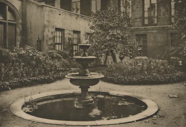 Ancient Mulberry Tree and Fountain in the Garden of Drapers Hall, c1935