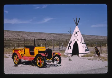 Apache Canyon Trading Post, teepee and car, Routes 62 and 180, Whites City, New Mexico, USA