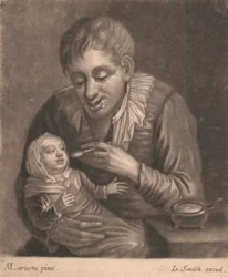 Man Feeding Child