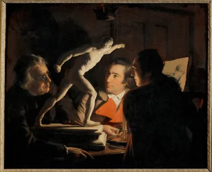 In the Light of a Candle, Three Men Study a Small