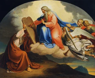 God writes the Ten Commandments for Moses on two stone tablets on Mount Sinai