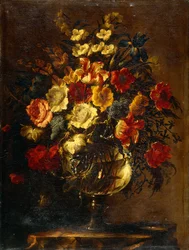 Flowers in a Glass Vase on a Rock