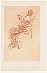 Young woman reading on a chair