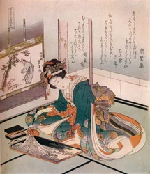 A woman making a miniature model of Mount Fuji