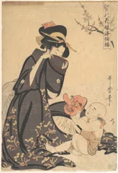 A Woman Playing with a Young Boy