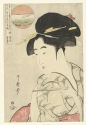 Bust portrait of young woman with fan