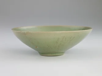 Bowl with Incised Design of Fish Among Waves