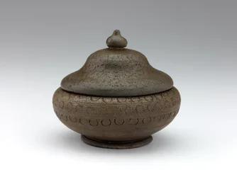 Cinerary urn with impressed decoration, late 7th century