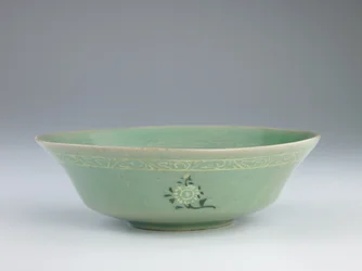 Dish with Mold-Impressed and Inlaid Decoration