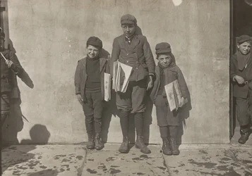 John Pento, 14 years old, Daniel and Angelo Pento, 7 years old, selling newspapers