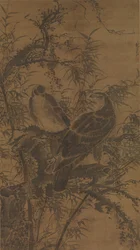 Two hawks in a thicket