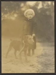 [Child with Dog on Leash]