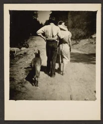 Couple Walking with Dog