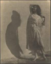 Dancer and Her Shadow on Wall