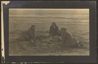 Figures Seated on the Beach