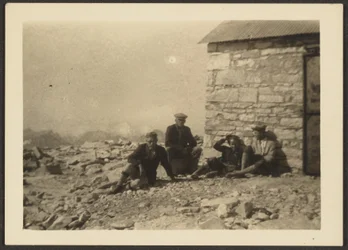 Figures and Stone Building