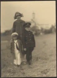 Florence and Her Two Boys in Military Outfits