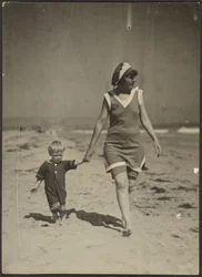 Florence and Infant Walking on Beach