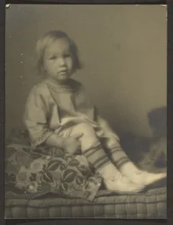 Little Girl on Cushion