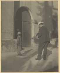 Man Photographing Poor Child