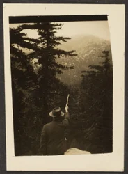 Man Pointing with a Stick