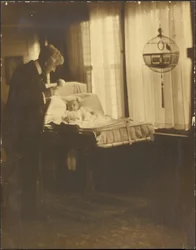 Man and Infant with Birdcage