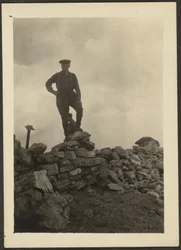 [Man on Pile of Rocks]