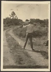 Man on Trail with Gun