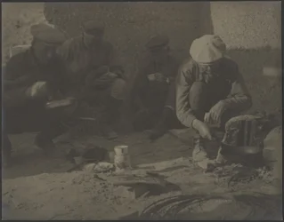 Men Around Campfire
