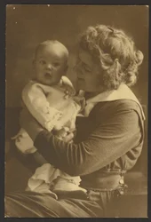 Portrait of Mother Smiling at Child