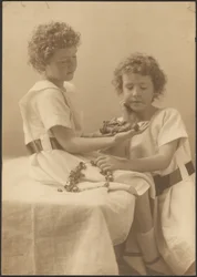 Portrait of Two Sisters Holding a Statue and Wreath