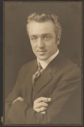 Portrait of a Man Holding Cigar