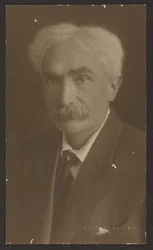 Portrait of a Man with Flower Tie Pin