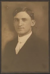 [Portrait of a Man with Watch Chain (not visible)]