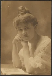 Portrait of a Woman Seated with Magazine
