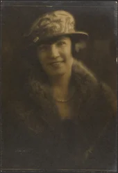 Portrait of a Woman in Hat with Decorative Motif
