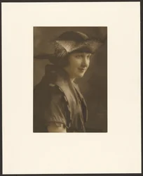 Portrait of a Woman in Straw Hat